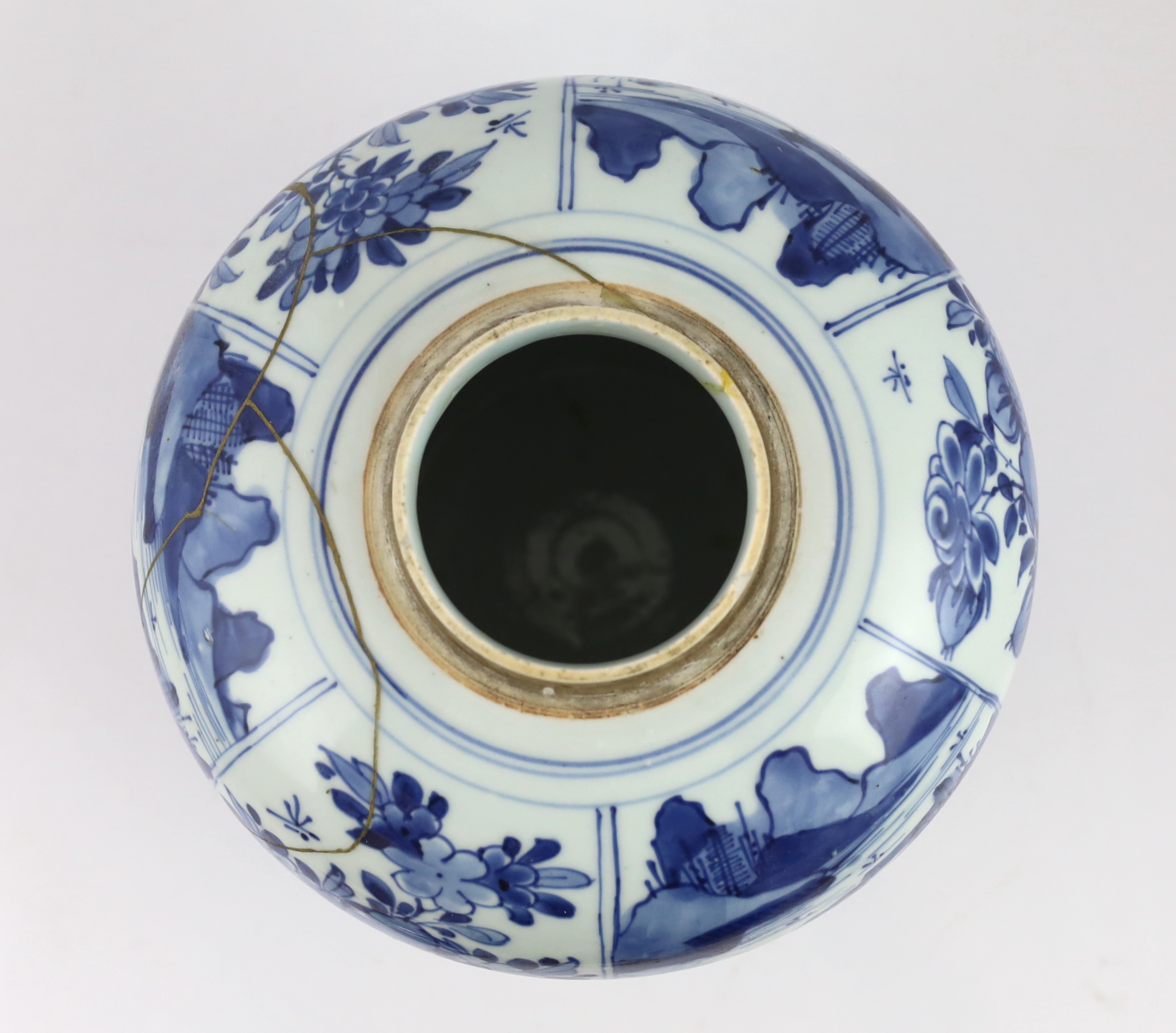 A Chinese blue and white ovoid jar and cover, Kangxi period, broken with kintsugi repair
